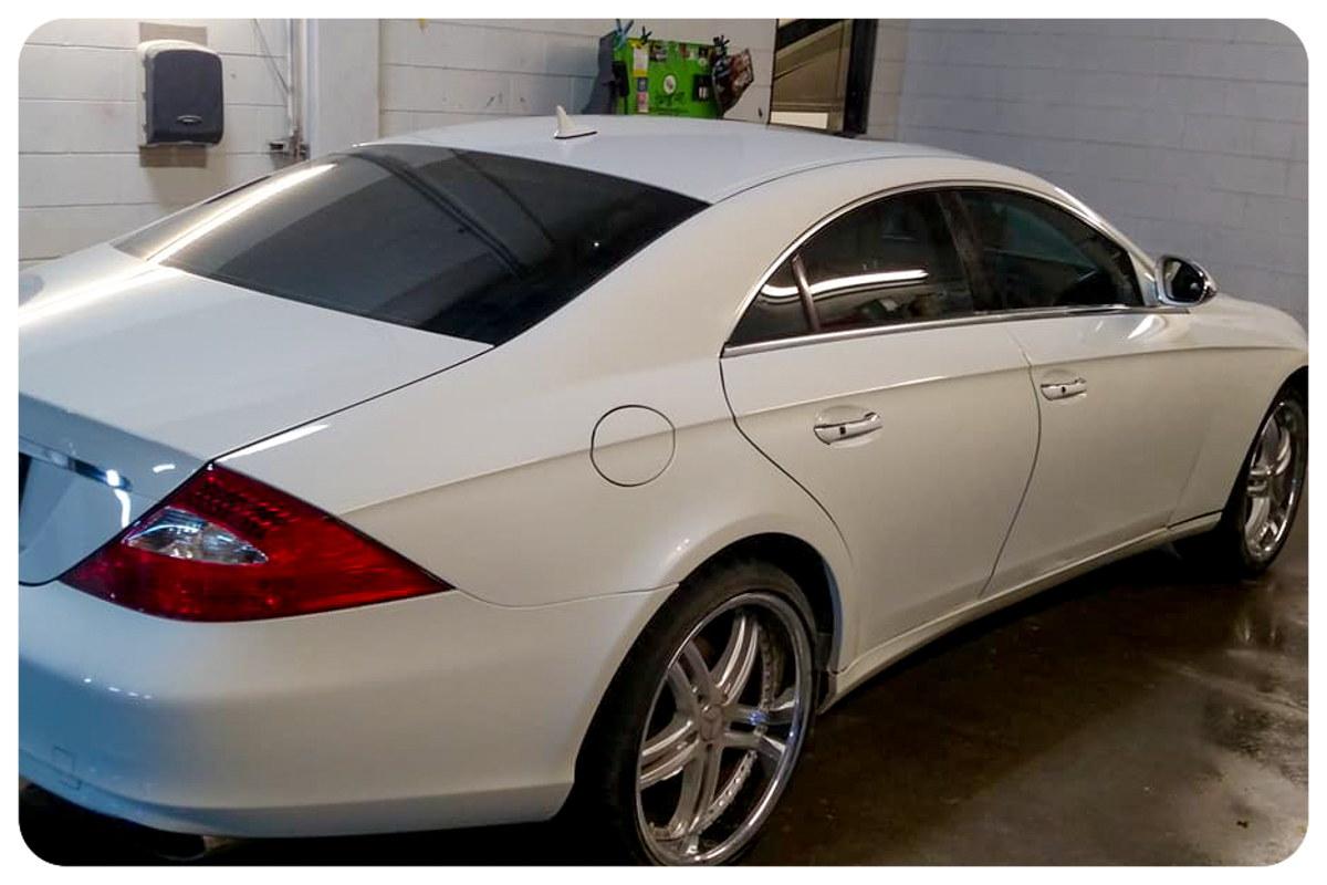 Mercedes-Benz CLS rear quarter view after full repaint