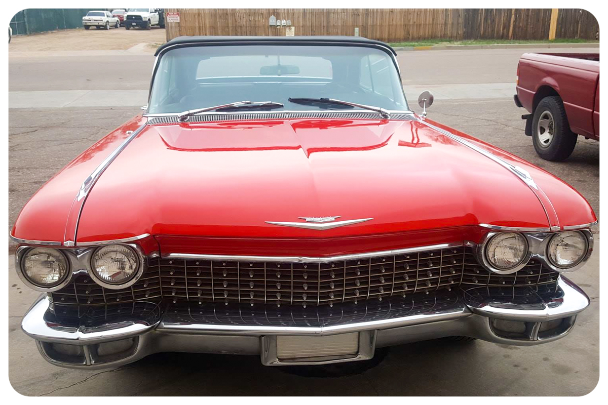 1962 Cadillac convertible front view with custom red paint