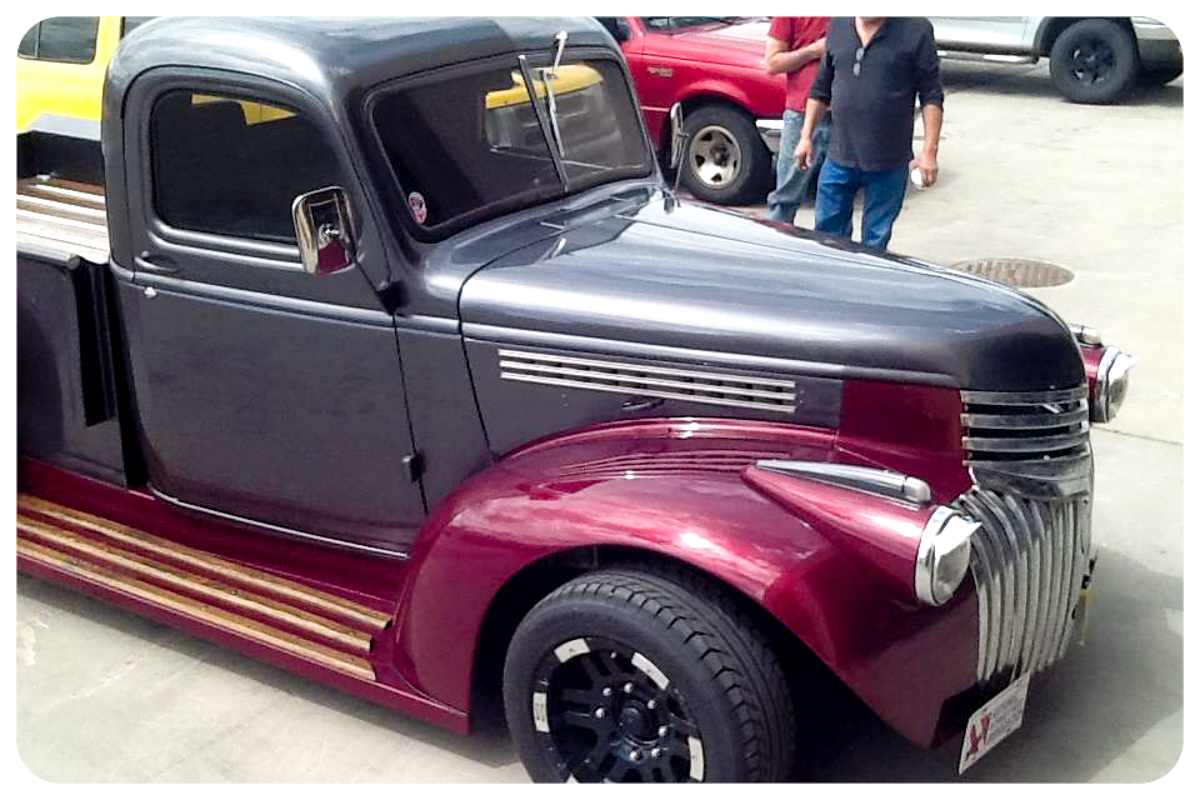 1941 Chevrolet pickup side angle showing custom paint and gold stripes